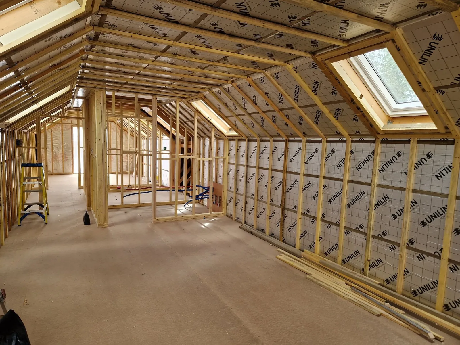 Room-in-roof timber framing with roof windows, built by MSB Carpentry
